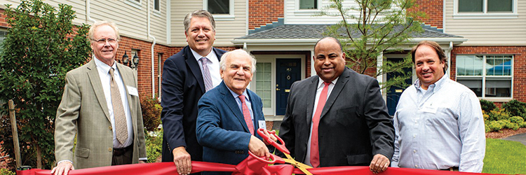 Chestnut Hill Realty holds ribbon cutting at Hancock Village - first phase of 175 apartment homes created under Chapter 40B